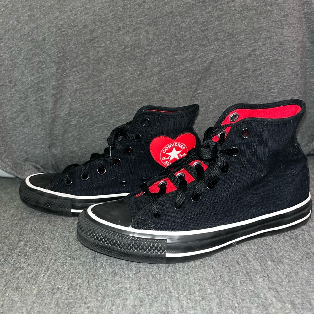 Customized all black Converse with red heart logo